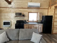 Blue Cabin in the woods close to Whiteman AF Base and Univ. of Central Missouri