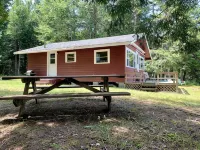 This beautiful cottage is set back 25 feet from Bog Lake in Northfield, Maine!