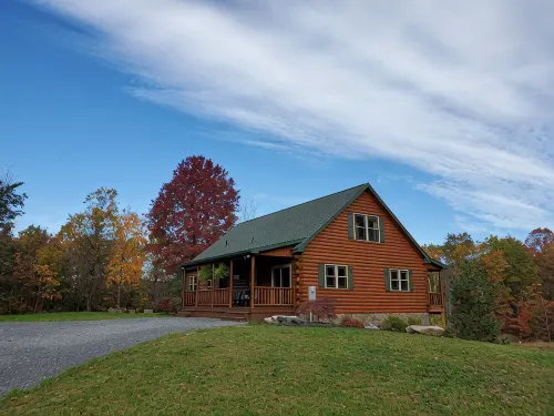 Cozy cabin in tranquil setting overlooking pond
