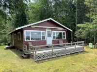 This beautiful cottage is set back 25 feet from Bog Lake in Northfield, Maine!