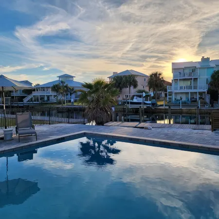 Beautiful Beach Home- 3 min walk to beach-Boat dock in back yard & private pool