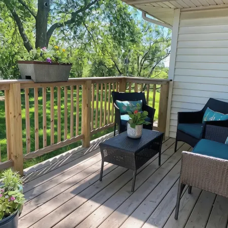 Cheerful two bedroom home in quiet neighborhood. Sun Porch ~ Patio ~  Large yard