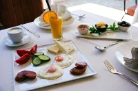 Okej Hotel - Desayuno