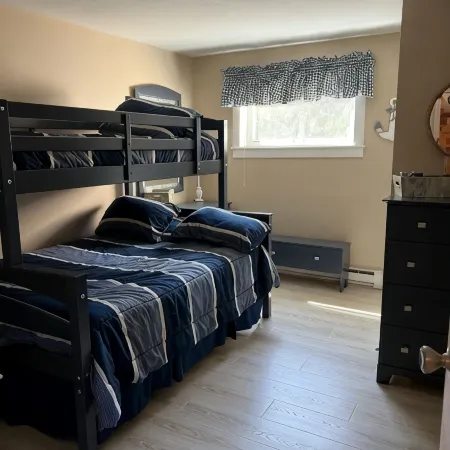 2 Bed/1 Bath Saunders Bay Gilford with boat slip. Walk to Meadowbrook for a show
