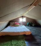 Cozy tiny cabin nested in the trees in a lake community, peaceful countryside.