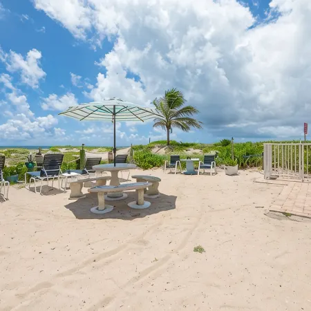BEACHFRONT COMPLEX! STEPS FROM THE OCEAN! HEATED POOL FULL KITCHEN FREE PARKING