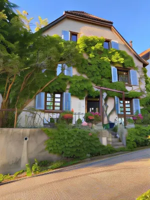 Maison des 5 Temps - Chambres Dhôtes de Charme à Ferrette فنادق في Wittersdorf