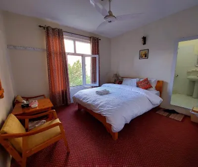 Gulmit Tourist Inn Hotels near Gulmit Waterfall