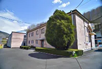 GreenWood Hotel