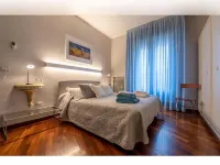 Large and bright penthouse in the heart of the city of Parma near the station - Huoneistot