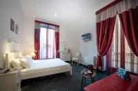 Maria Vittoria Charming Rooms and Apartments - Chambres d'hôtes