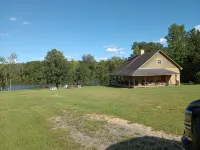 Cozy private cabin on 10 acres with 300+ feet of water front. Pet friendly.
