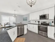 3rd house from beach with heated pool & tiki bar. 2 master suites + 2 bedrooms. - Boutique