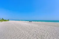 熱帶花園距薩尼貝爾海灘僅數步之遙的公寓大廈 - 沙灘