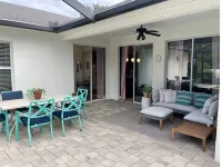 Cheerful 4 Bed, 3 Bath Home with Screened Pool