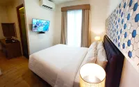 Bening Boutique Hotel - Syariah Hotel - Parkplatz