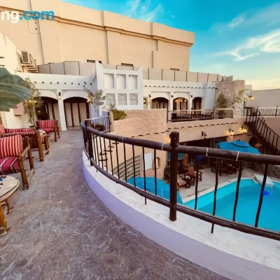 Al Liwan Suites Hotels near Ansar Gallery