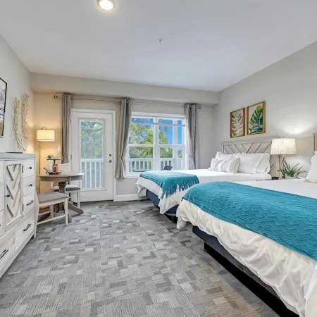 No Cleaning Fee! Brand New Double Queen Studio Condo w/ Waterfront Pool + Beach