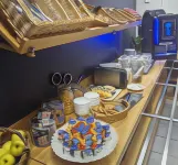 裏摩北基里亞德直營酒店 - 早餐
