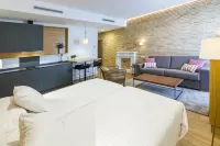 Aquitania Home Suites - Apartments