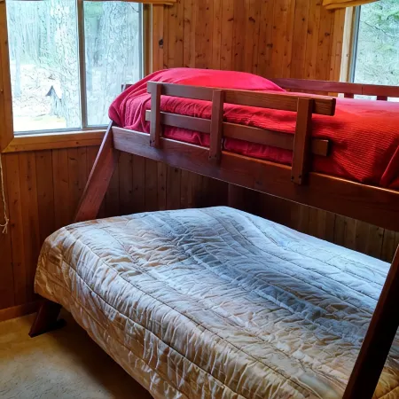 Island Getaway! Nestled in the woods with easy access to sandy beach