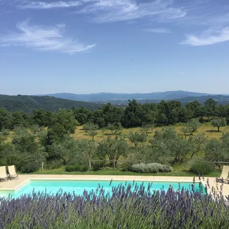Poggio Corsucci - Il Nido: intimate stone house with pool and enchanting views