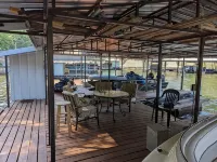 Beautiful waterfront lake house with private dock on calm cove - Wifi
