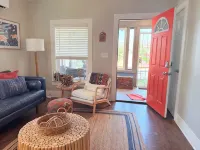 Refined Miner’s Cottage: Fenced Yard, Screened Porch.