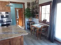 Catalpa Cottage is named after the giant Catalpa trees surrounding the cottage ~