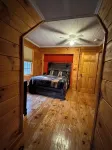 3/2 Log Cabin with year round rushing creek. Hot tub, wifi, A/C, arcade game. - 3-Star