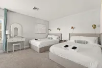 The Eastside ~ Modern Coastal Getaway w/ Pool, Private Beach, Sauna and Dock - balcony