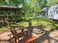 Relaxing Riverfront, Private Dock, & Hot Tub - WiFi