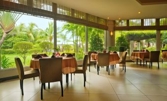 a large dining room with tables and chairs set up for a group of people to enjoy a meal at Mount Sea Resort Hotel and Restaurant Cavite