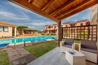 Marina Manna Hotel and Club Village فنادق في Badesi