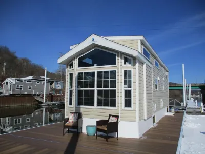 Waterfront Glamping Escape  Cozy Floating Cottages on the Peaceful Beaver River Hotels near The Belvedere at Beaver Station