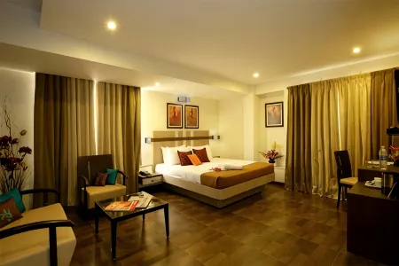 Hotel Utsav Deluxe Отели рядом с достопримечательностью «СКТРС Пуна Институт оф Компьютер Текнолоджи»