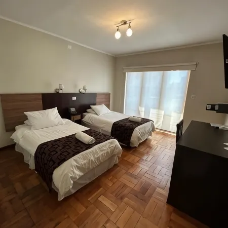 Hotel Plaza Ñuñoa Отели рядом с достопримечательностью «Торговый центр Paseo Quilin»