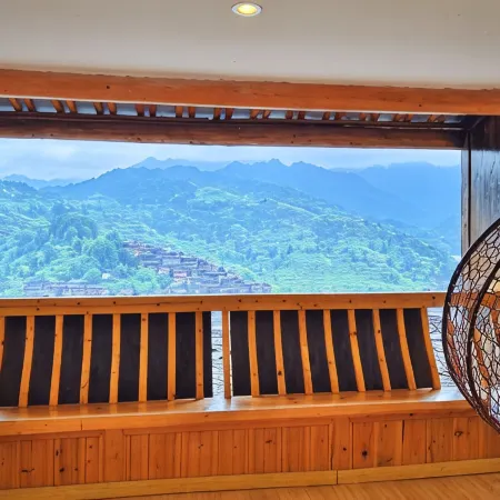 Luanxi Yunshu Garden Homestay (Xijiang Qianhu Miao Village Observation Deck Zhuzhuan Coffee Shop)