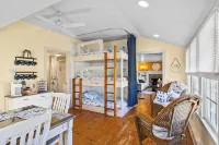 Charming Seaside Cottage  Sleeps 9 with WiFi, AC, 2 Min Walk to a Private Beach
