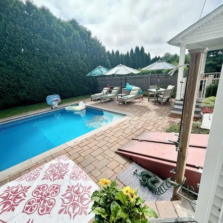 Spacious 5Bdrm Home- Saltwater Pool, WiFi, AC, Private Beach Parking Pass