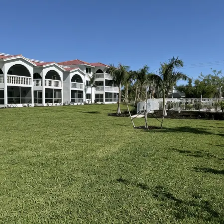 End unit with extra windows. Steps to the beach, private beach access!