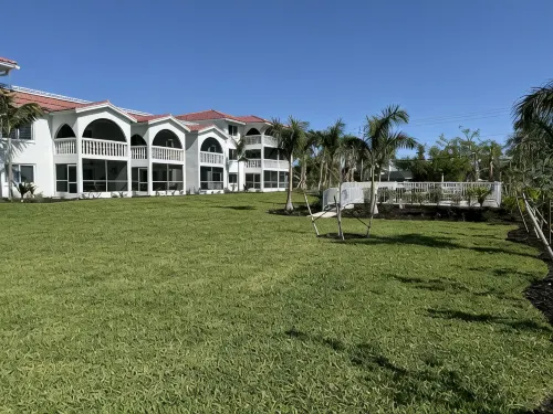 End unit with extra windows. Steps to the beach, private beach access!