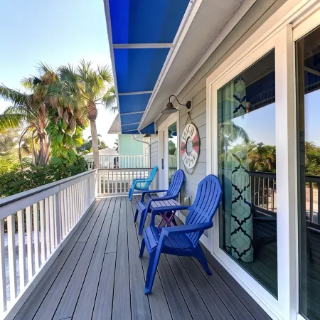 Perfect location Walk to the village and beach Private Balcony Heated Pool