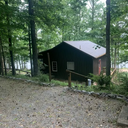 Lake Front Cottage with private sandy beach