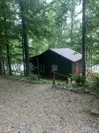 Lake Front Cottage with private sandy beach - 4-Star