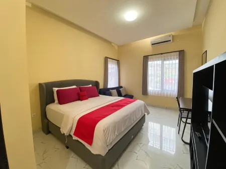 RedDoorz Syariah at Jitu Guest House Purwokerto Отели в г. Banyumas Regency