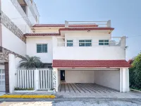 Spacious 5-bedroom house with AC, WiFi near to the beach