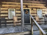 The Natchez - quiet front porch & rockers.