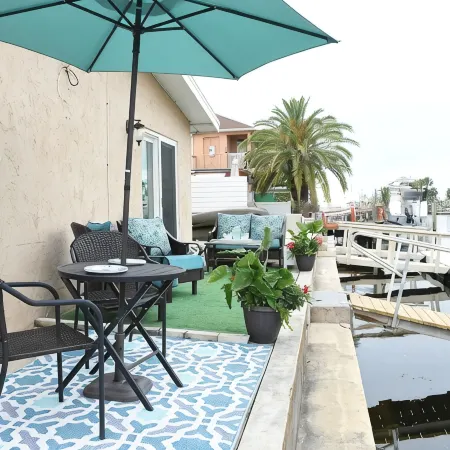 Unique waterfront home, Hot Tub, private boat dock,  walk to beach, pet friendly
