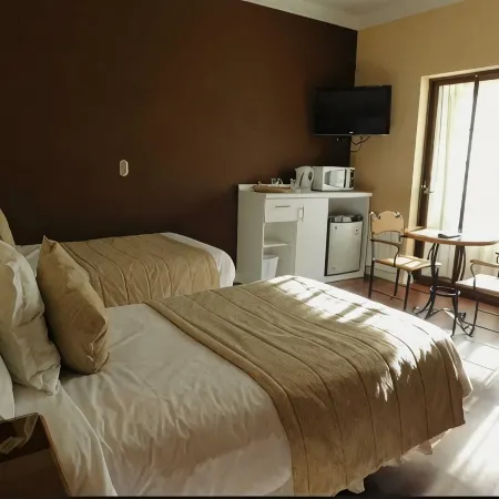 Hotel Inti Kuyen Plaza Отели в г. Пукон